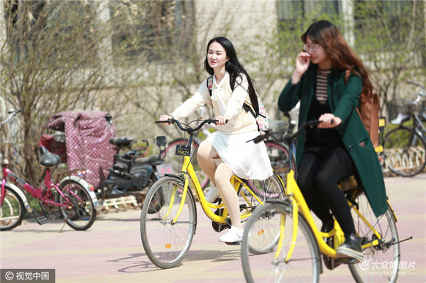 济南:共享单车受大学生欢迎 校园骑行成风景_